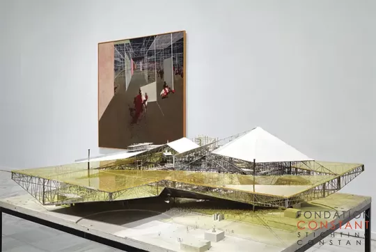 View of “Constant,” 2015–16. Foreground- Grote gele sector (Large Yellow Sector), 1967. Background- Entrée du labyrinth (Entrance to the Labyrinth), 1972.