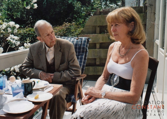 Constant and Trudy sitting outside on the veranda Constant and Trudy sitting outside on the veranda