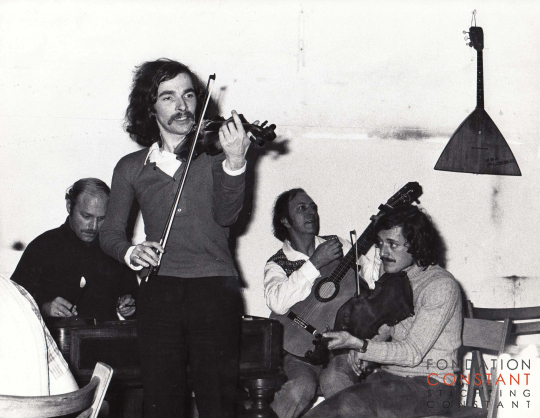 Constant is making music with three musicians Constant is making music with three musicians