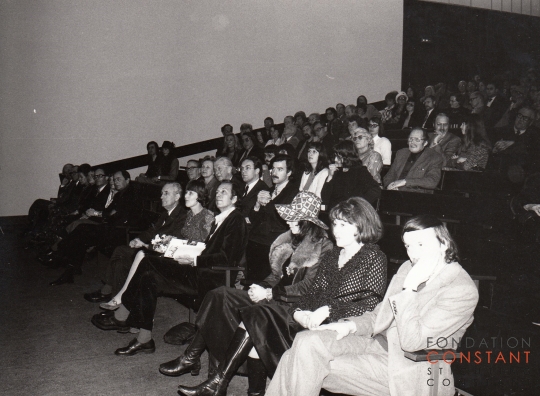 Constant and Nel Kerkhoven sitting in a lecture hall. Constant and Nel Kerkhoven sitting in a lecture hall.