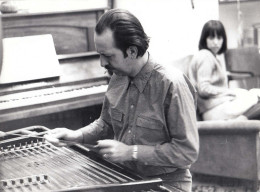 Constant playing the cymbalom, with Martha in the background