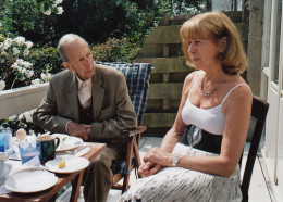 Constant and Trudy sitting outside on the veranda 
