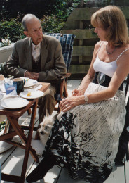 Constant and Trudy sitting outside on the veranda 